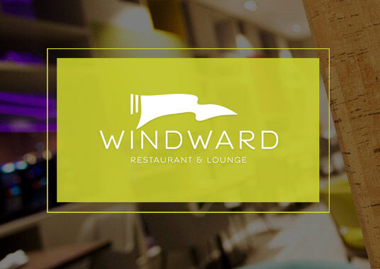Windward Restaurant and Lounge Logo overlayed on photo of dining area