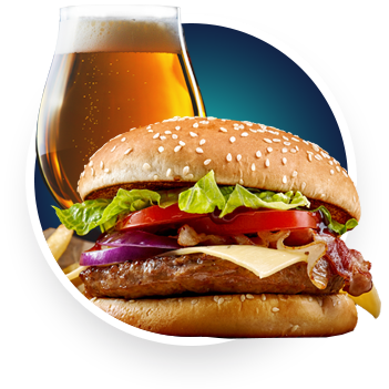 A hamburger and a glass of beer.