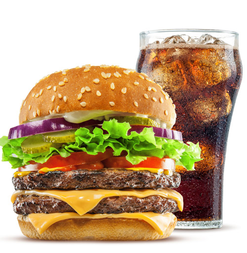 A delicious hamburger along with a refreshing glass of cola.