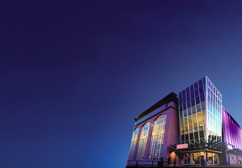 The Great Canadian Casino Vancouver is lit up at night.