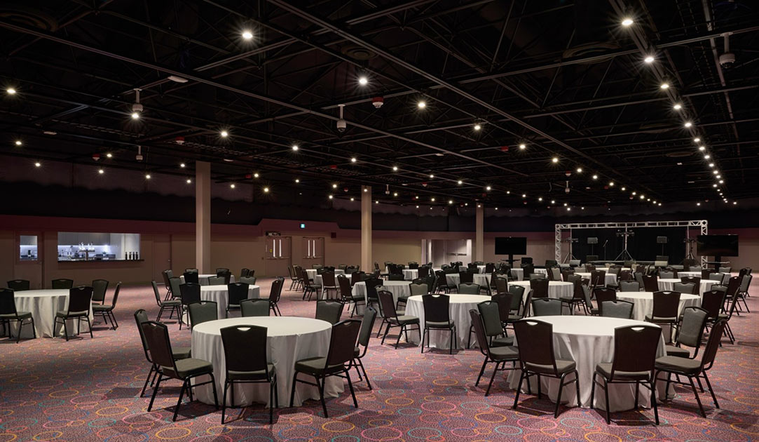An entertainment and Special Events Venue with tables and chairs set up.